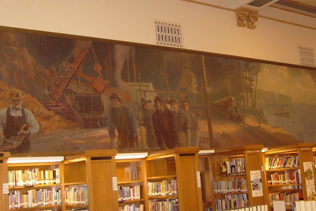 HIbbing High School mural of iron miners